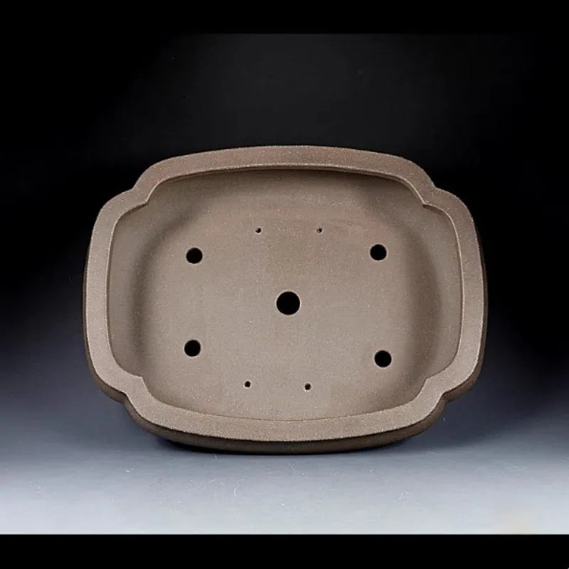 Handmade antique papaya-shaped purple clay flower pot measuring 46cm long by 35.5cm wide.