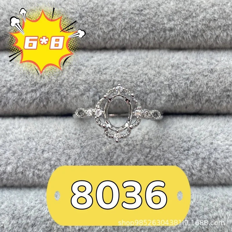 Oval denier ring with 6x8mm stone, open mouth design, and five-pointed star detail
