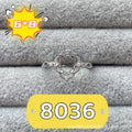 Oval denier ring with 6x8mm stone, open mouth design, and five-pointed star detail