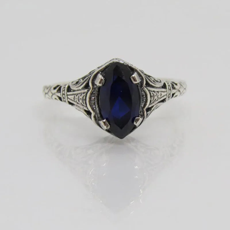 Silver geometric hollow women's ring in electroplated alloy showing openwork pattern