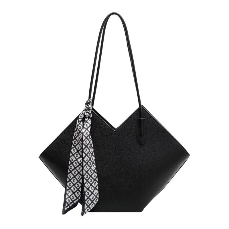 Women's large black PU leather shoulder bag with square shape showing exterior pocket and adjustable handle