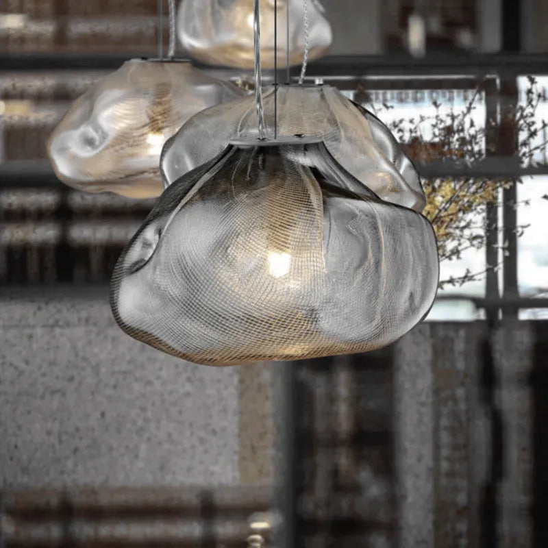 Modern glass chandelier with fabric accents in clear, amber or smoke grey colour options