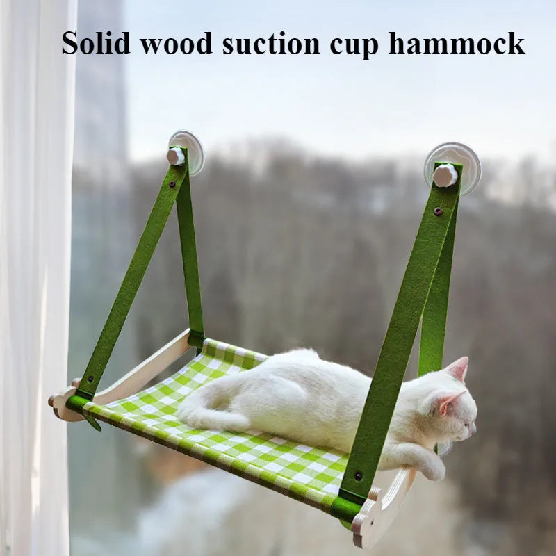 Wooden cat window hammock with linen fabric attached to window using suction cups