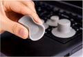Grey plastic laptop cooling pad set showing two larger and two smaller pads for temperature reduction