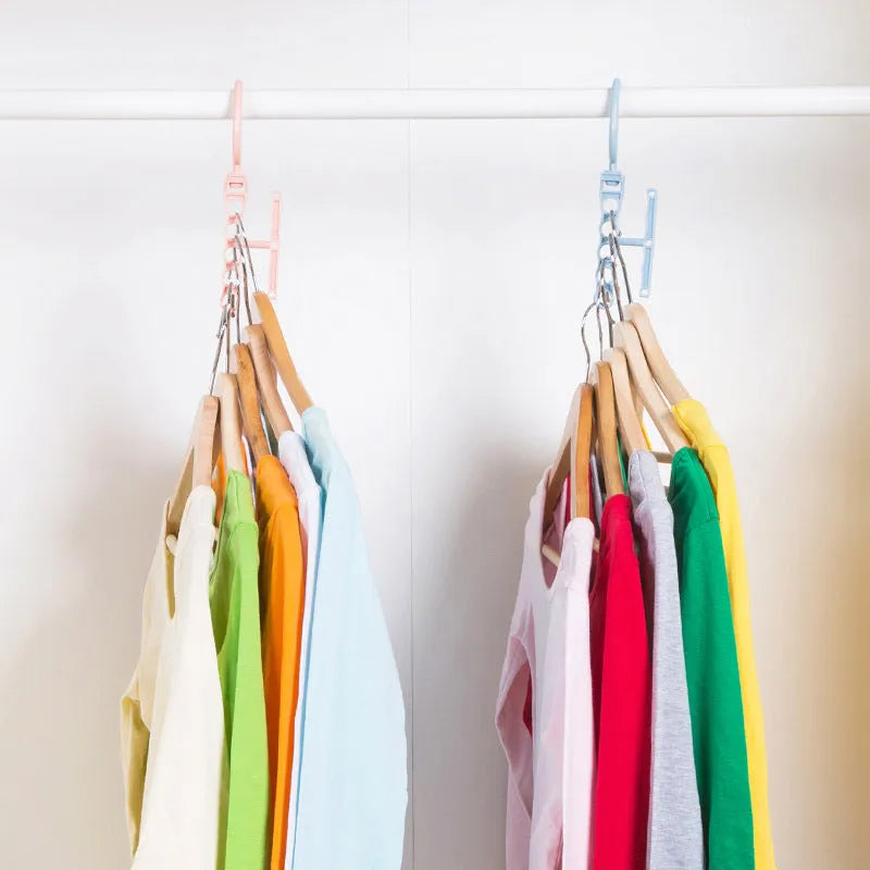 Blue revolving wardrobe hanger with five holes and a handle, made from PP plastic.