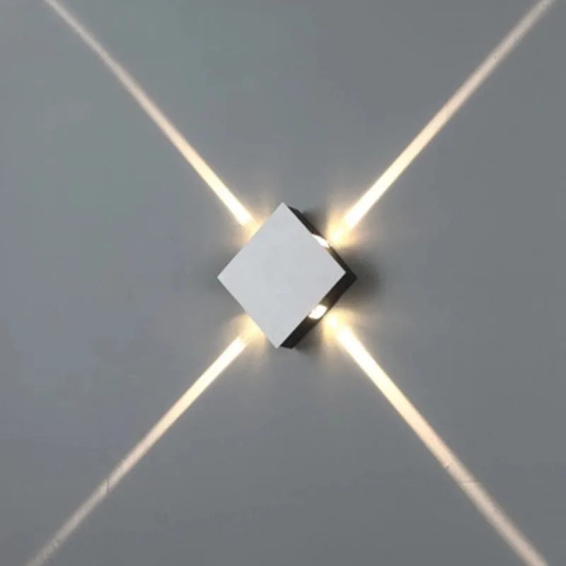 Modern square and round aluminium LED wall light with iron shade in warm white or white.