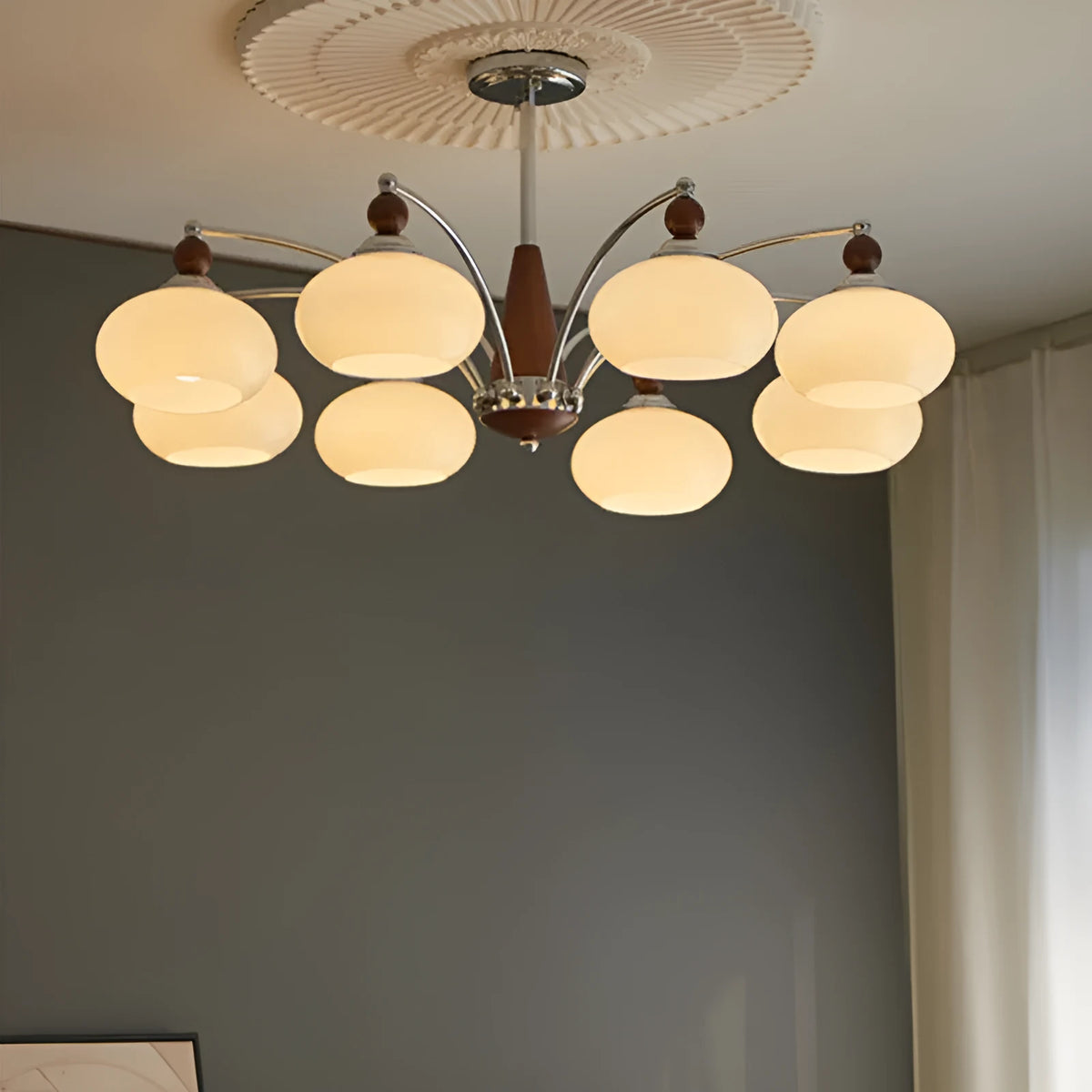 Persimmon glass ceiling chandelier with chrome frame and multiple glass lampshades in a Middle Ancient style.