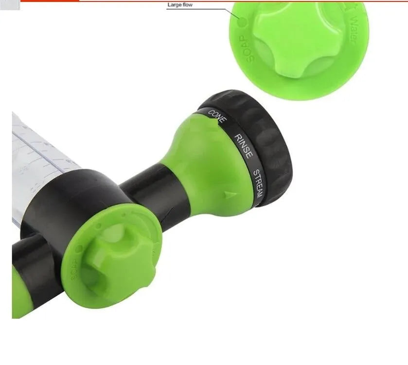Green high pressure foam spray gun with multiple spray pattern settings and hose connection