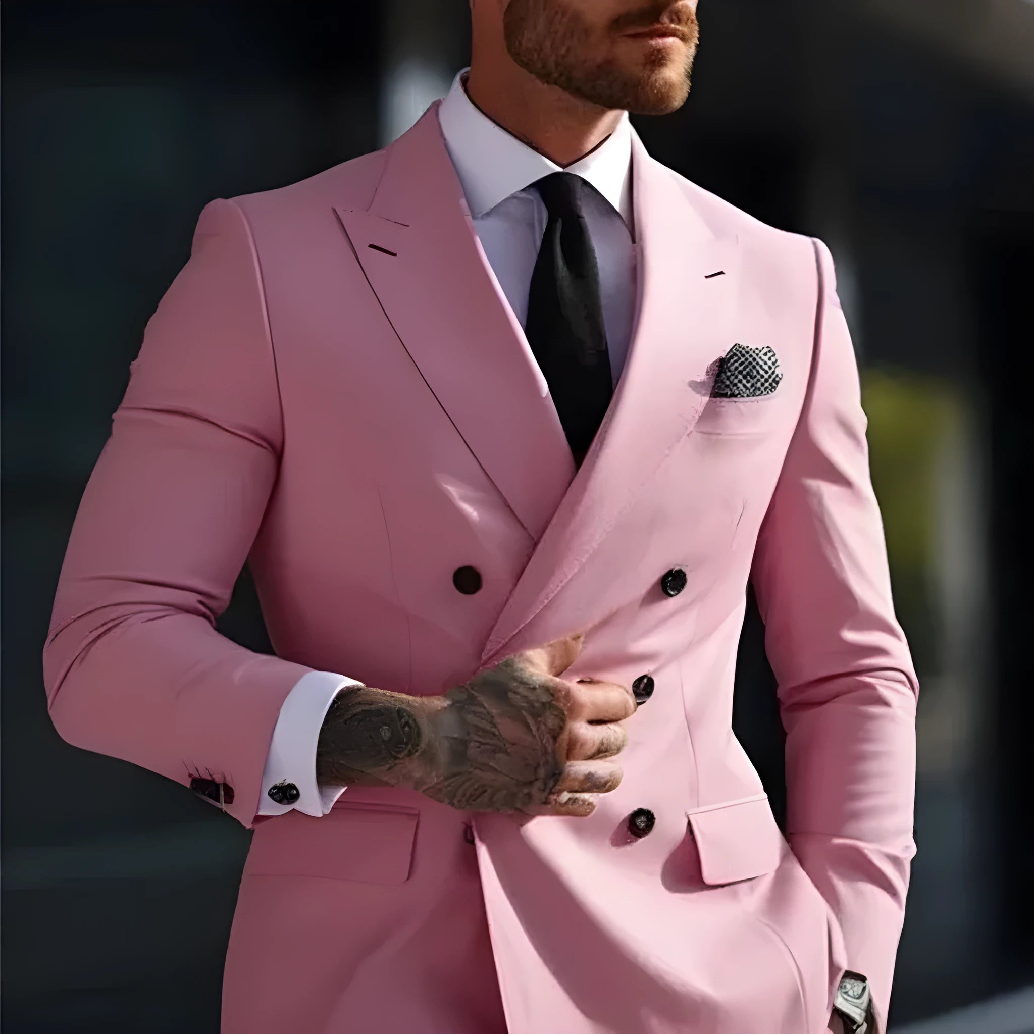 Men's slim fit two-piece suit in a cotton blend fabric, shown in a light business or banquet setting.