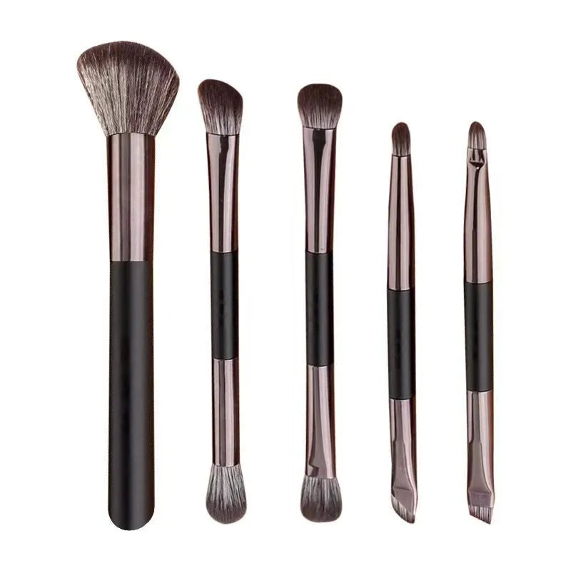 Portable makeup brush kit with mirror showing silver handle eyeshadow brushes