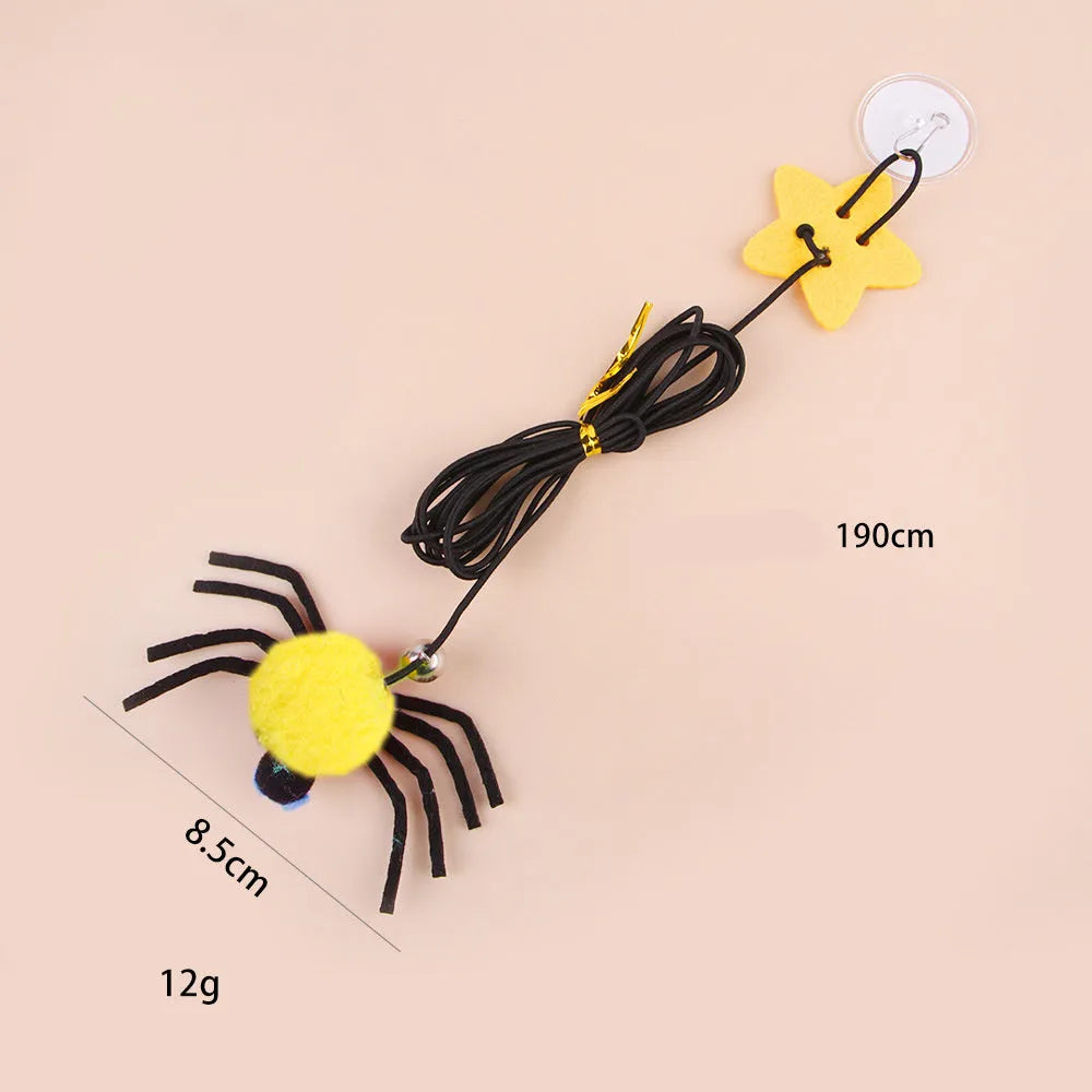 Hanging door cat toy with elastic rope, feather bell spider attachment in red colour