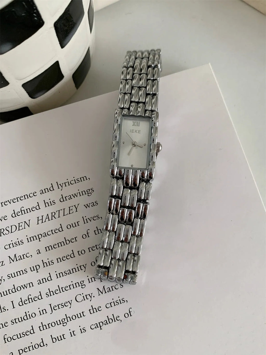 Women's mid-ancient bracelet watch with 7mm thickness and 15mm dial on wrist