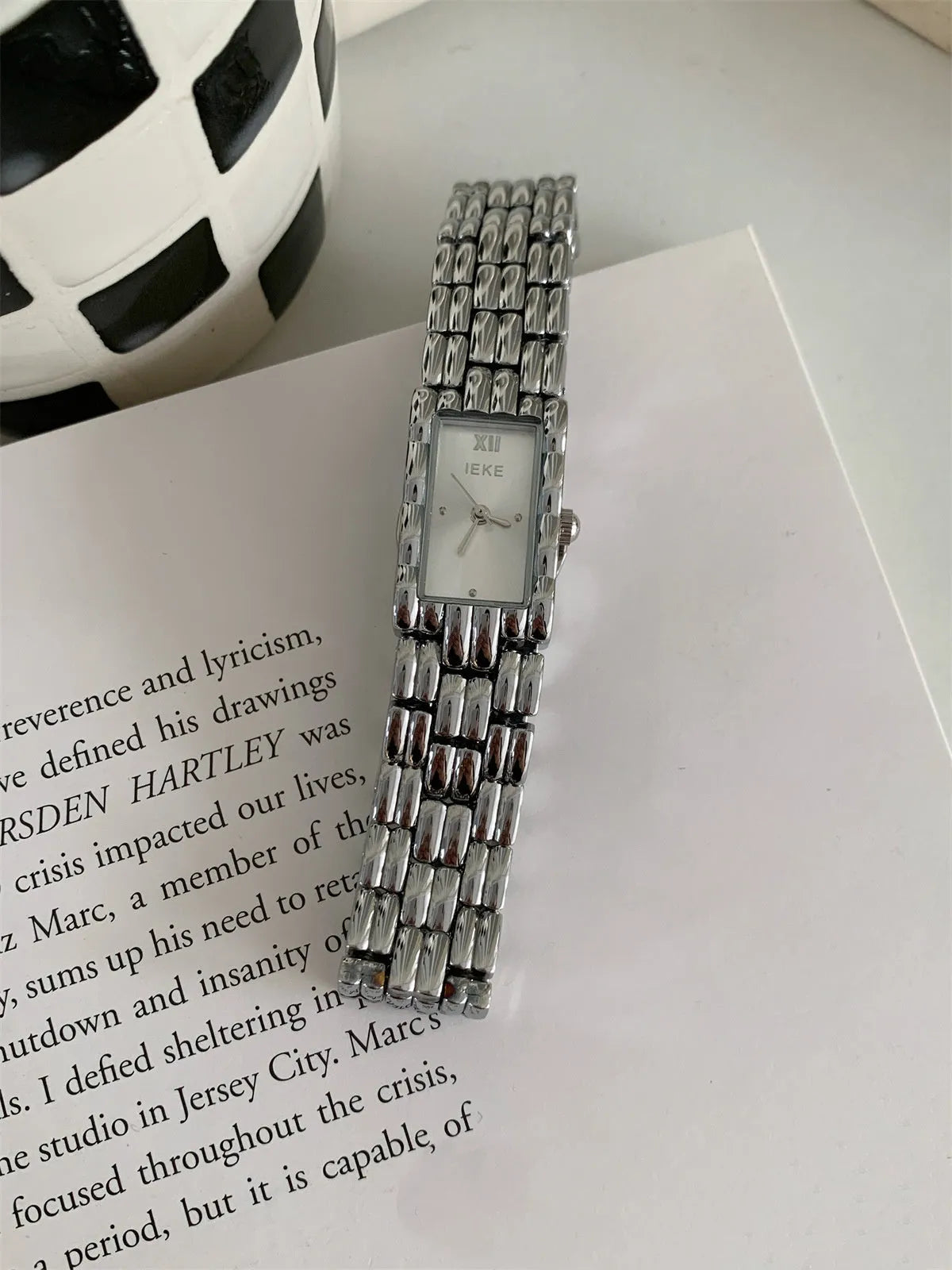 Women's mid-ancient bracelet watch with 7mm thickness and 15mm dial on wrist