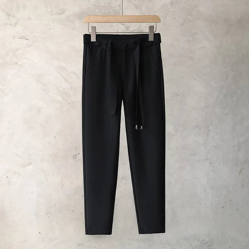Boys slim straight wool trousers in grey, showing tapered fit and straight leg opening.