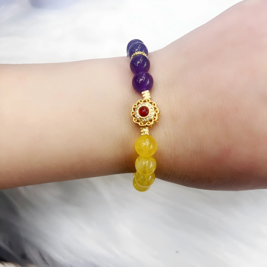 Handmade women's amethyst crystal bracelet with yellow and purple beads