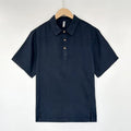 Men's loose-fit linen summer top with thin lapel collar and short sleeves on a hanger.