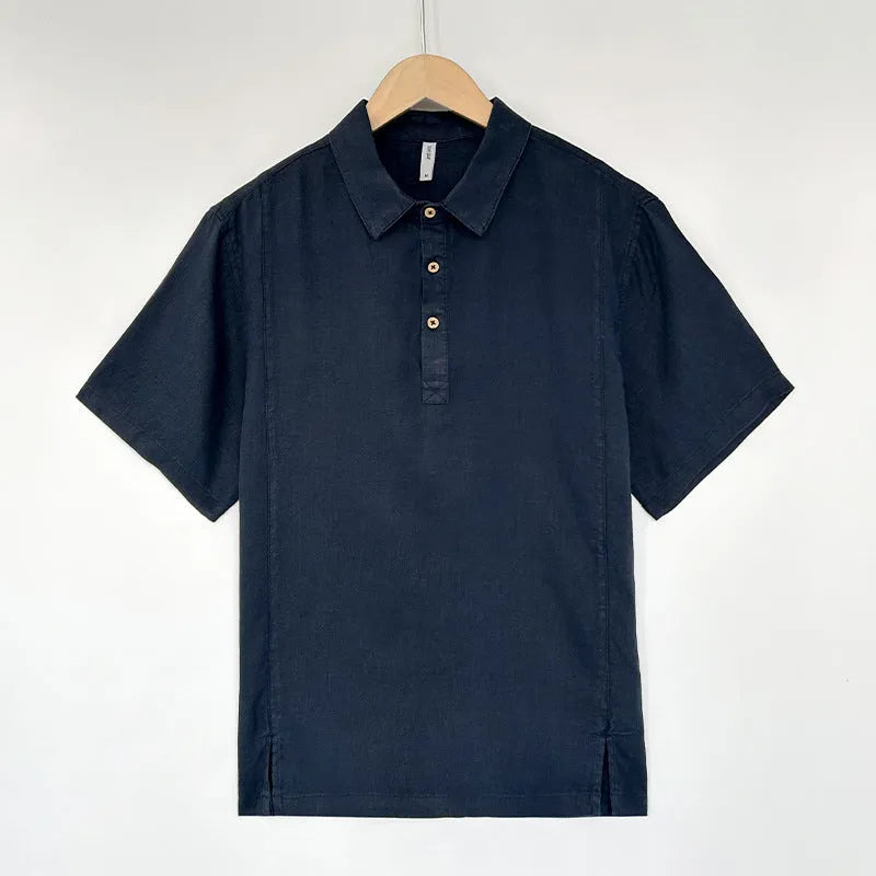 Men's loose-fit linen summer top with thin lapel collar and short sleeves on a hanger.