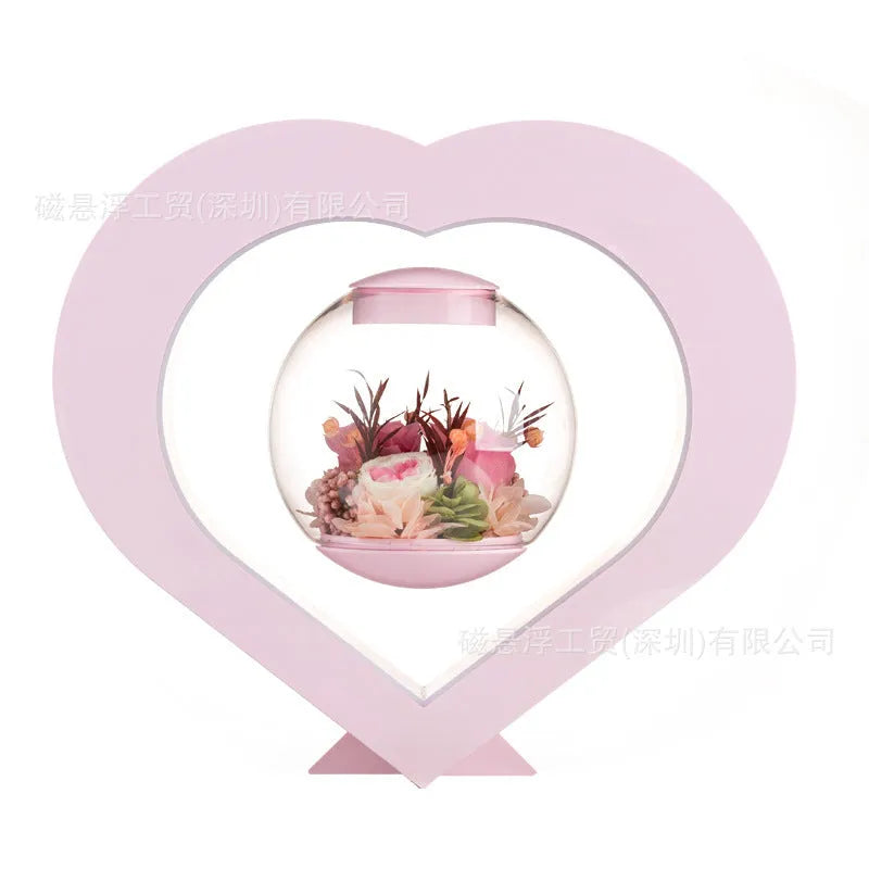 Pink preserved rose ornament in a gift box with optional bluetooth base and international plugs