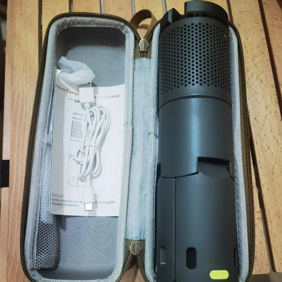 Portable LED camping lantern in off white or dark grey colour with battery compartment and button switch