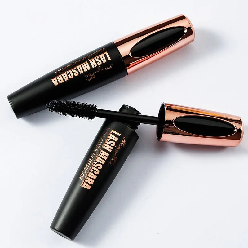 Black waterproof mascara tube showing thick long curling lash effect