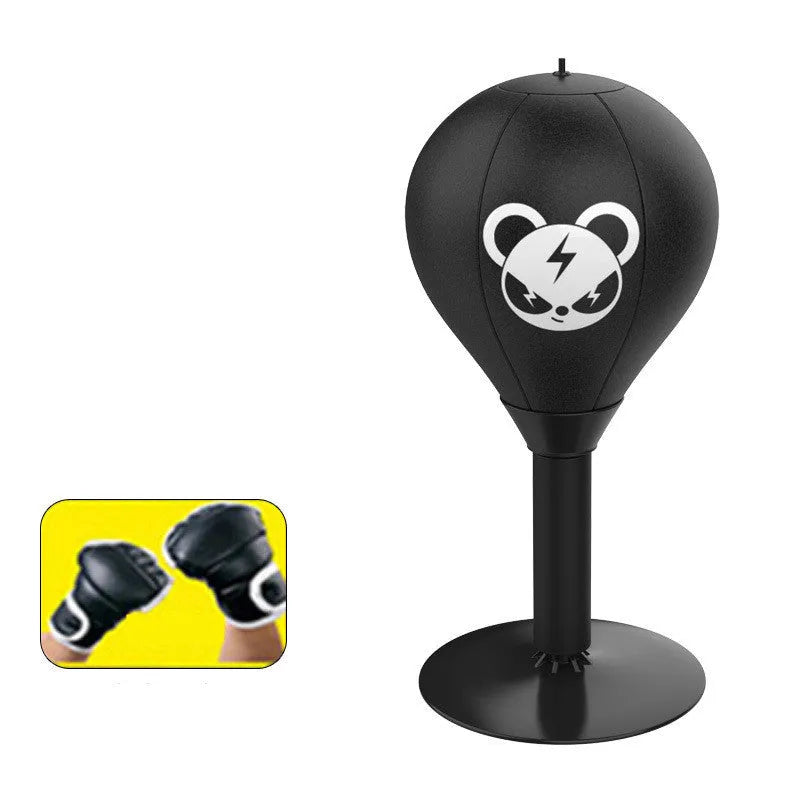 Tabletop boxing speed ball with suction cup base, inflatable PU leather ball, pump, and optional gloves on a desk.