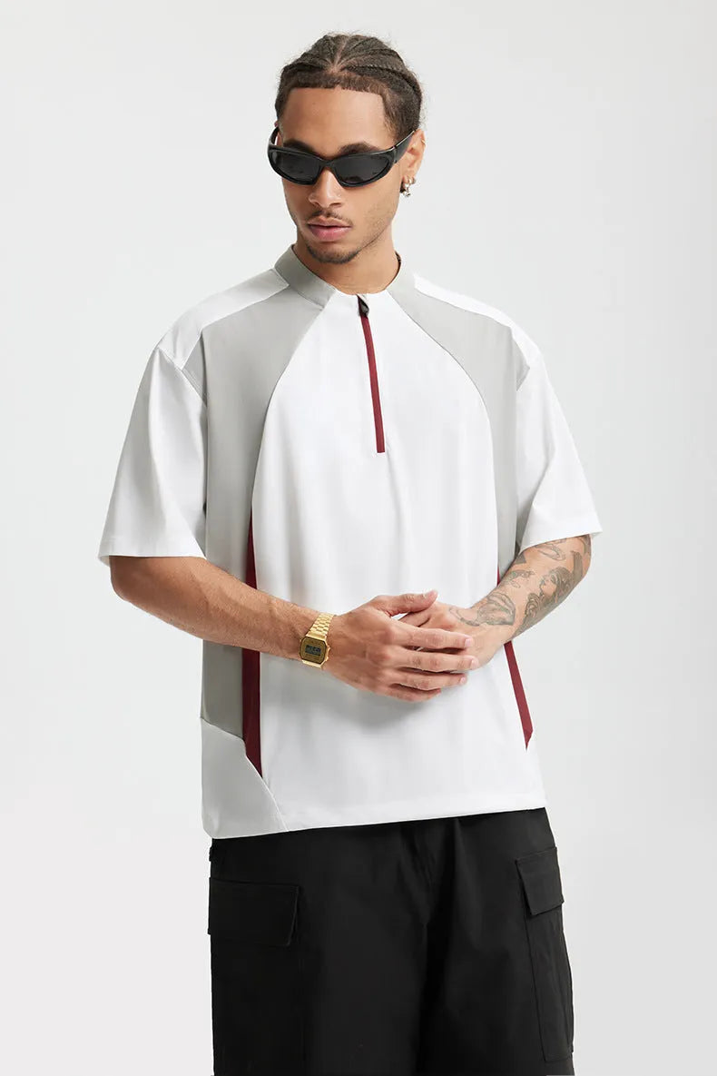 Men's lightweight solid colour polyester top in black, available in short sleeve and long sleeve styles.
