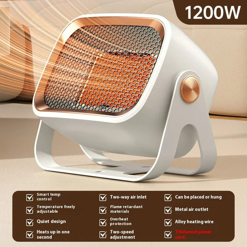 Compact grey PTC ceramic desktop heater with rotatable body on a wooden desk