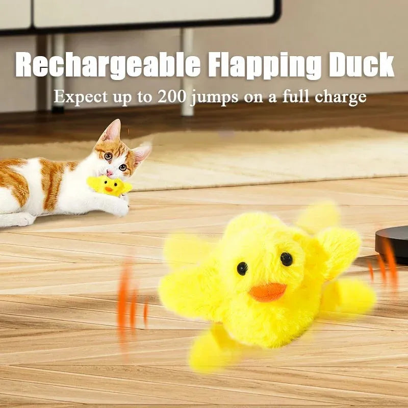 Yellow flapping duck plush cat toy with vibration sensor on a grey background.
