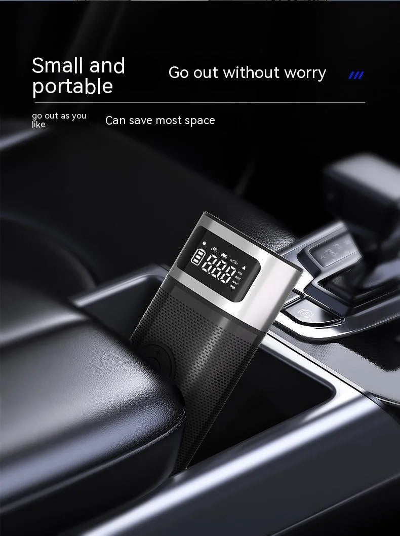 Black portable wireless vehicle air pump with USB-C cable and multiple inflation nozzles in storage bag