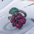 Black gold geometric flower ring with diamond-treated simulation red corundum stone