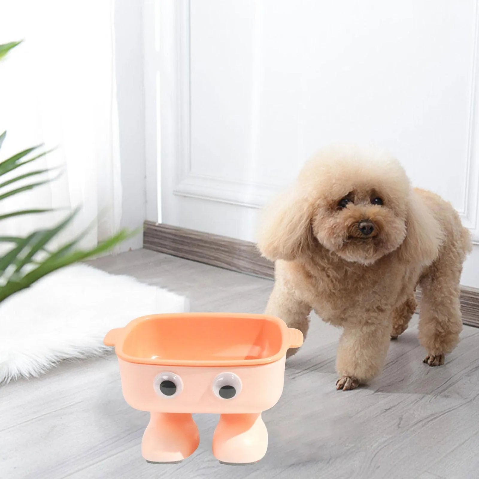 Green elevated cat bowl with cartoon robot design and 15° tilt angle