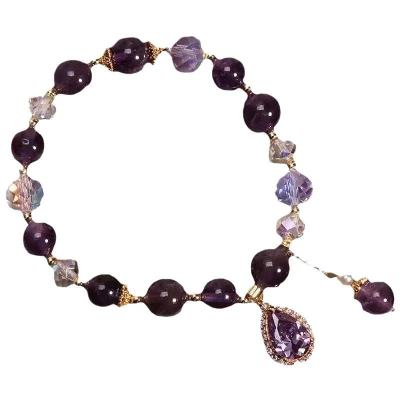 Purple amethyst crystal bracelet for women with micro inlay detail.