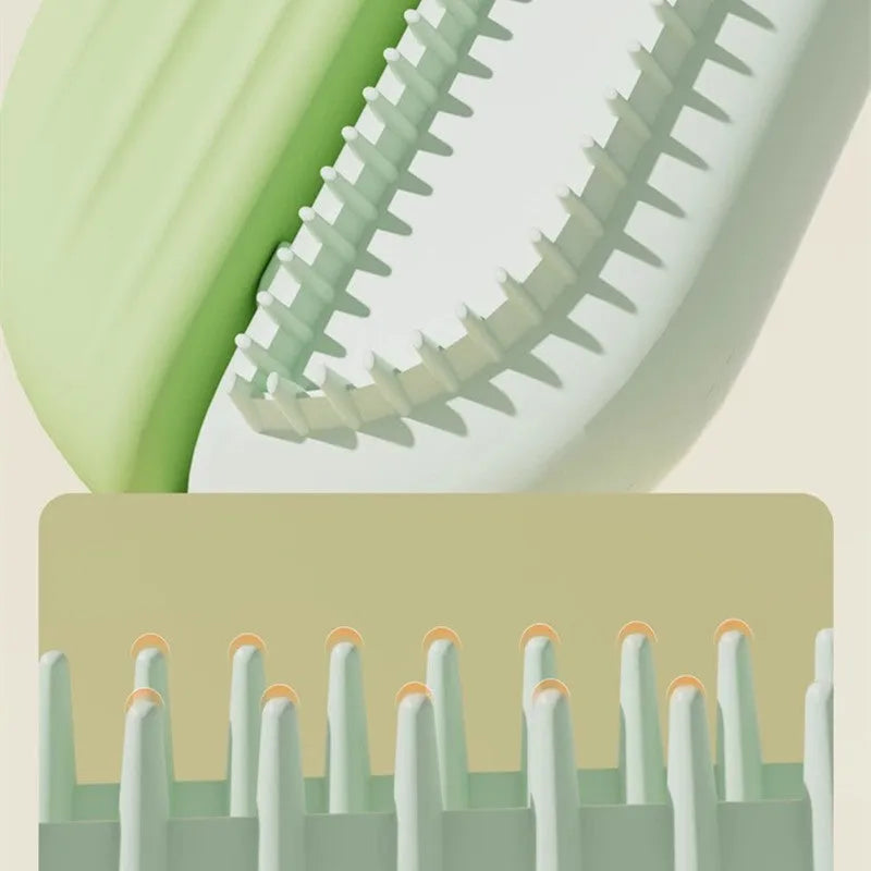 Blue pet grooming comb with water tank and four comb head types.