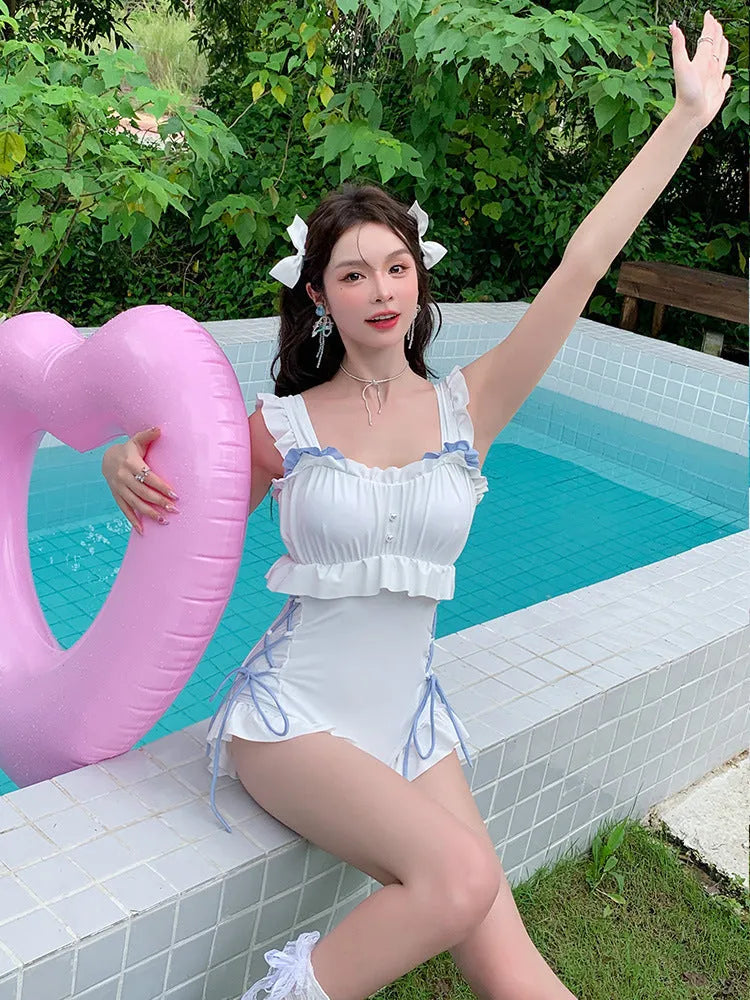 Women's milky white backless one-piece swimsuit made of nylon with polyester lining