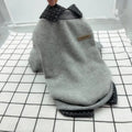 Grey dog sweater with detachable hood collar on small dog showing thin velvet knit polyester construction