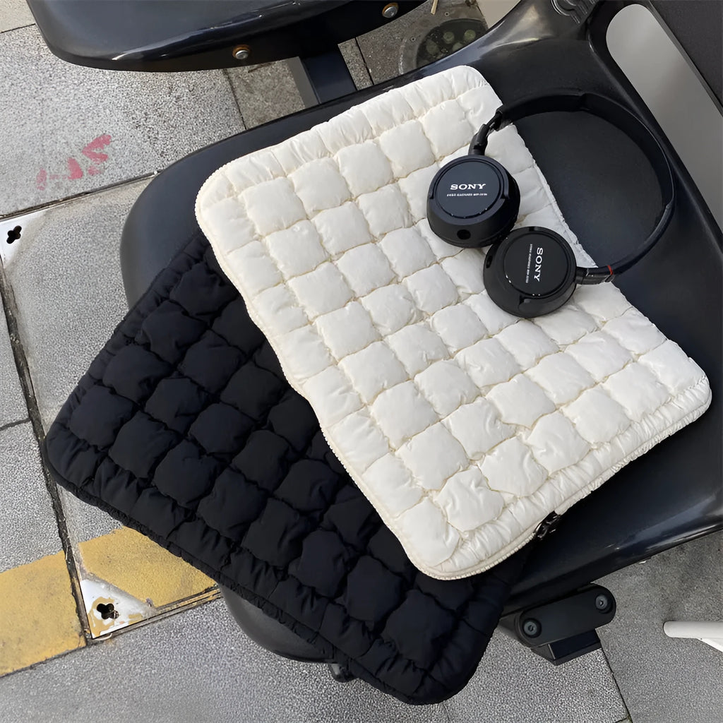 Large black nylon laptop bag with cloud cotton interior, shown open to reveal storage compartments.