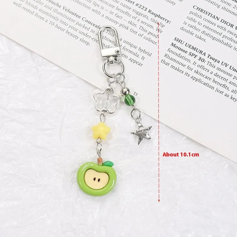 Fruit pattern mobile phone charm keychain with apple and strawberry designs in plastic resin material
