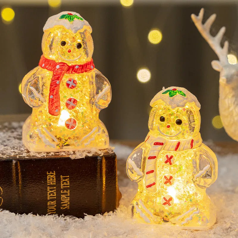 Glowing gingerbread man Christmas ornament with LED light and red scarf, measuring 6.5cm wide by 10.5cm tall