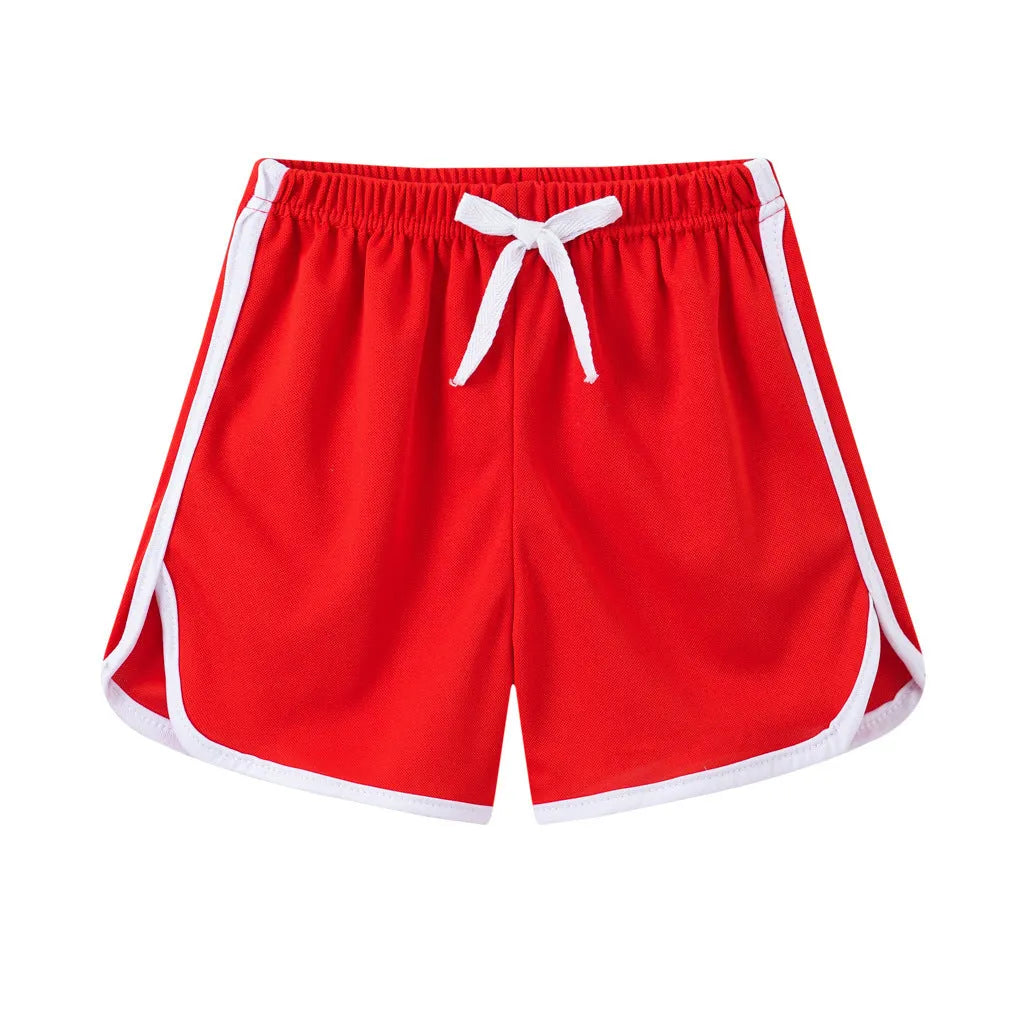Children's polyester beach shorts in multiple prints and solid colours with size range 100-140cm