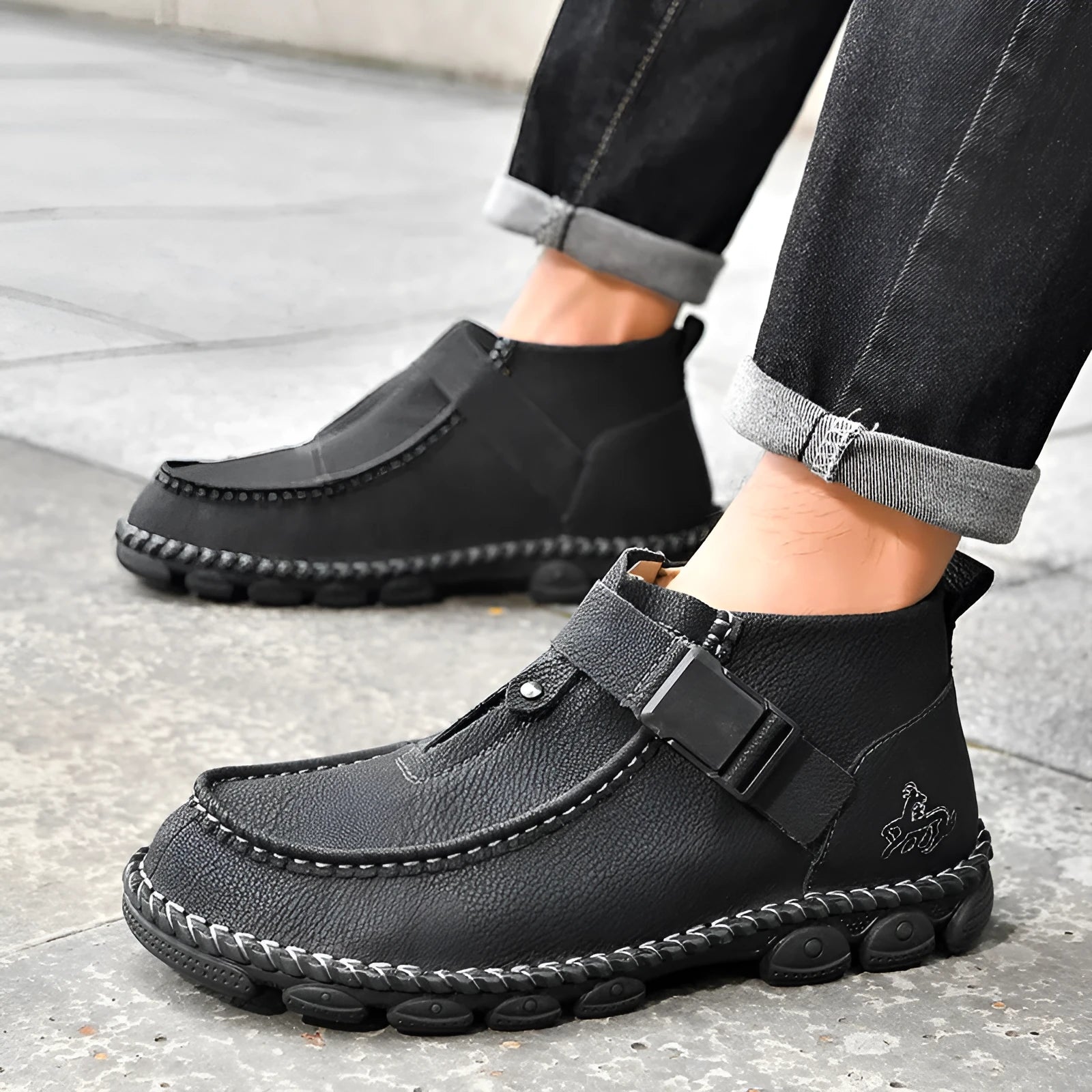 Casual flat slip-on shoe with handmade stitching on a brown PU leather upper.