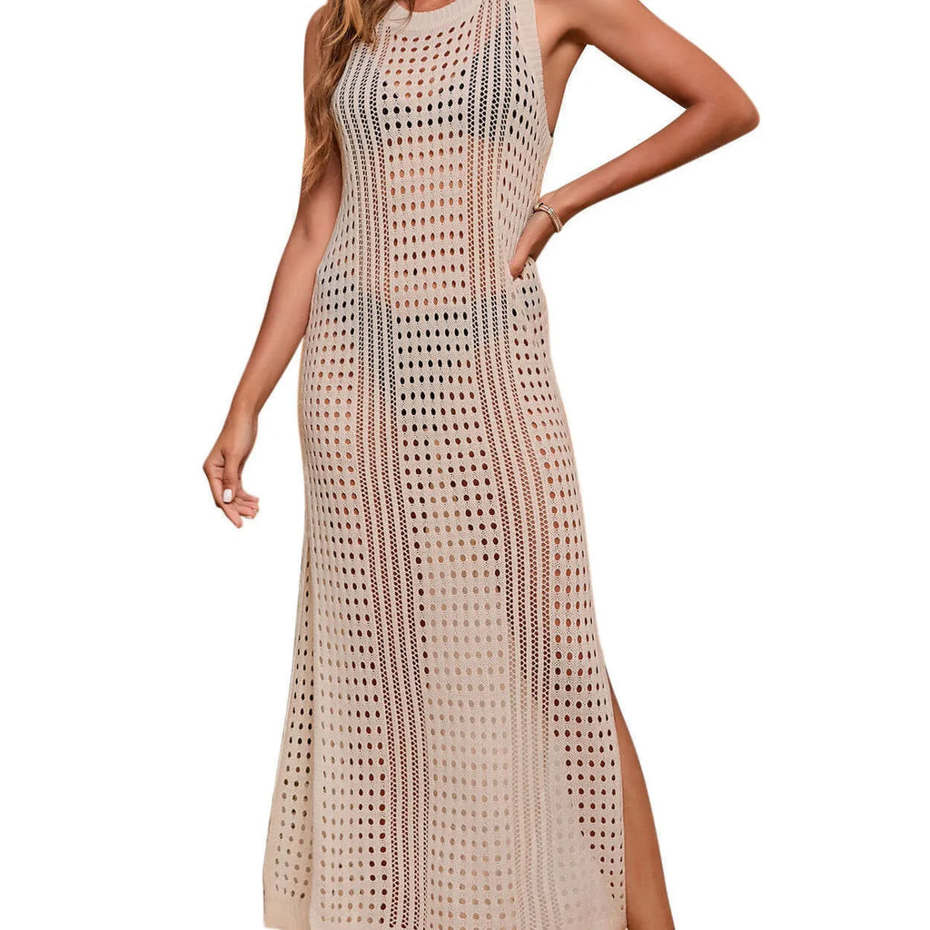Long loose knitted beach blouse for women in a solid colour with a hollow-out design.