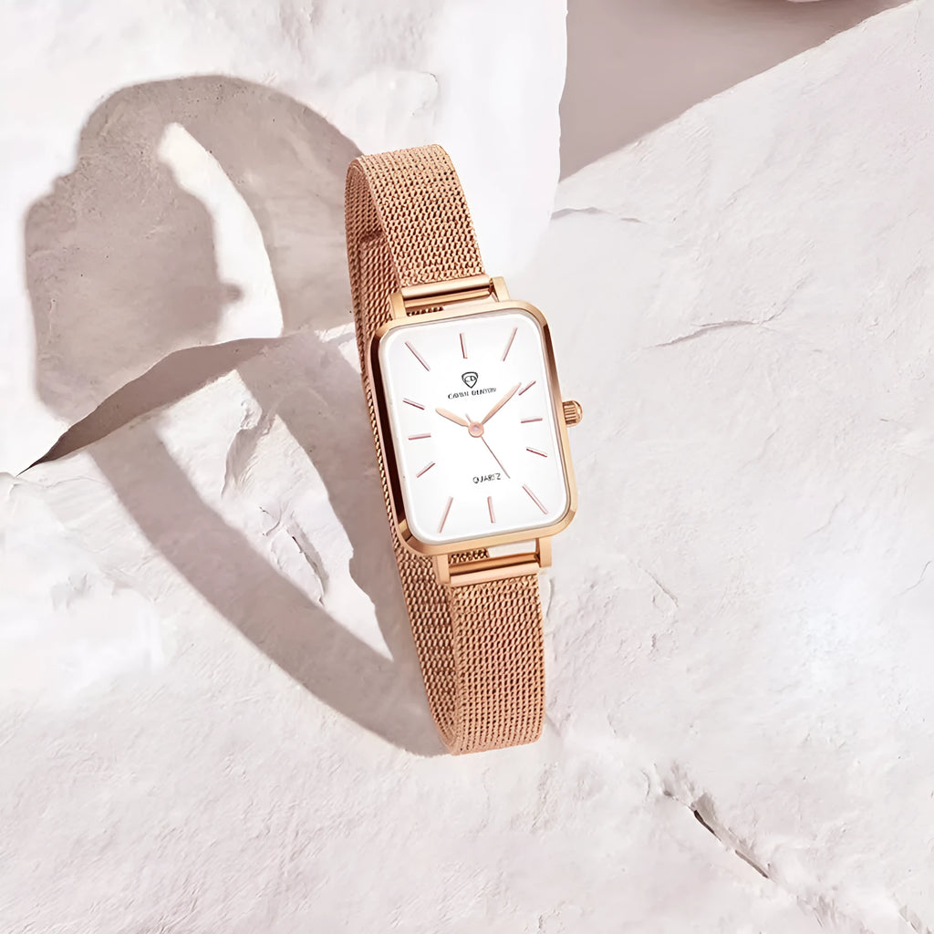 Women's waterproof quartz watch with alloy case and woven steel strap in rose gold colour