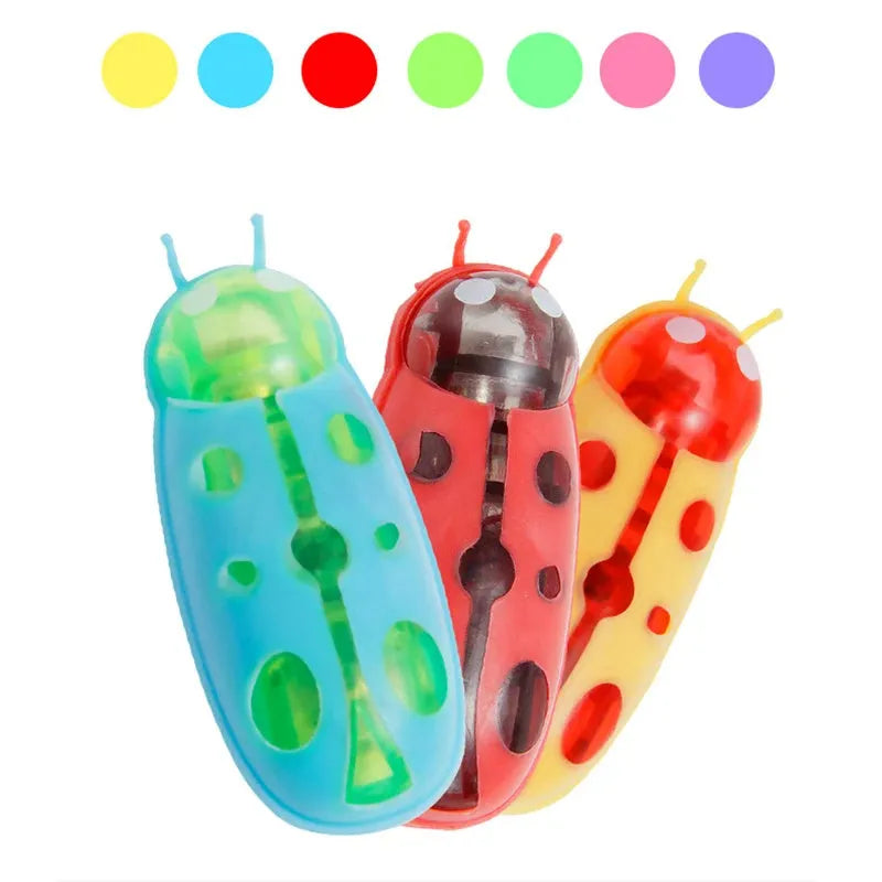 Mini electric bug cat toy showing ladybird beetle shape with angular legs