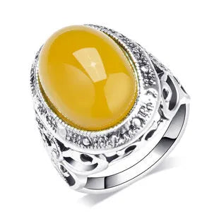 Retro geometric alloy ring with fluorescent beeswax and antique silver plating, shown in size 10.