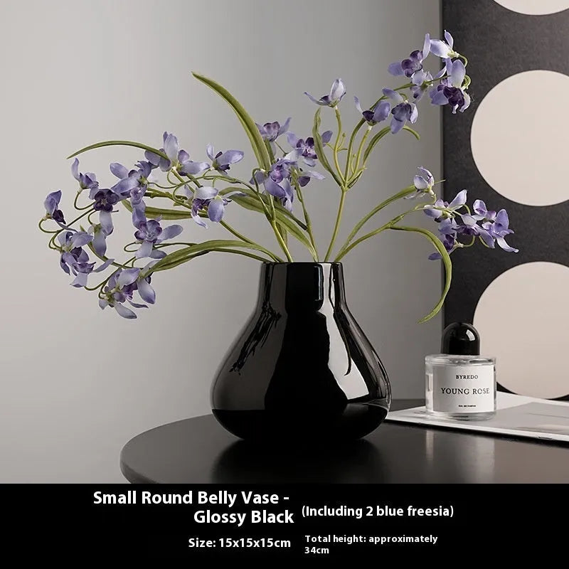 Ceramic round belly French decorative vase with artificial orchid flowers in black or white colour options