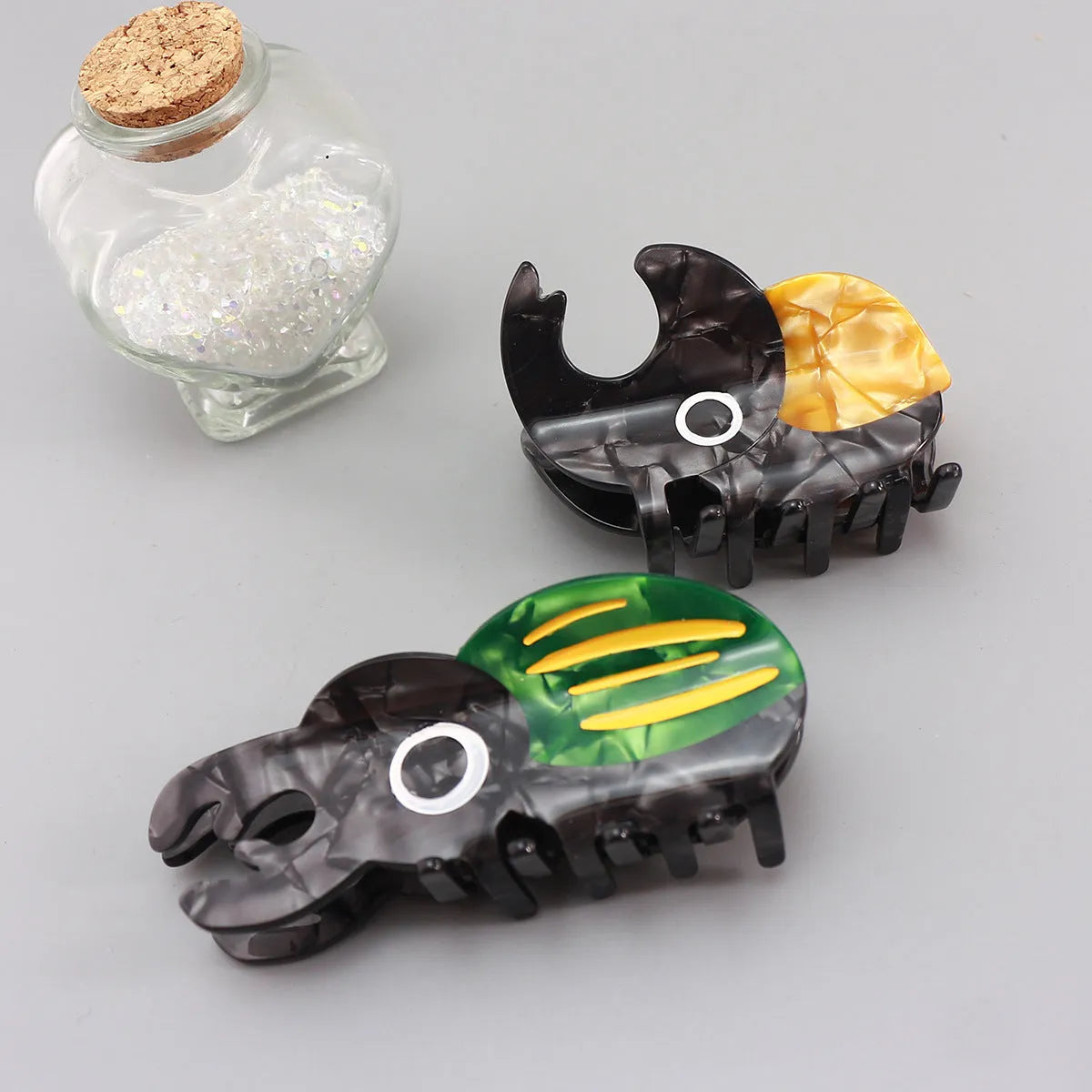 Handmade green cellulose acetate beetle grip keychain with cartoon caterpillar decoration
