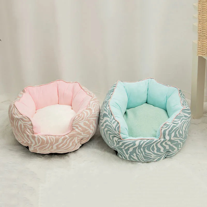Blue octagonal pet bed for small dog with high sides and removable interior mat.