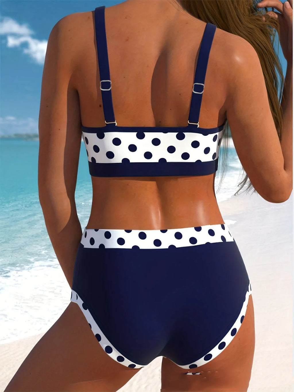 Men's conservative swim briefs with a multicolour small dot pattern, made from polyester.
