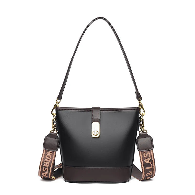 Black PU leather bucket bag with double shoulder straps showing internal compartments and external pocket