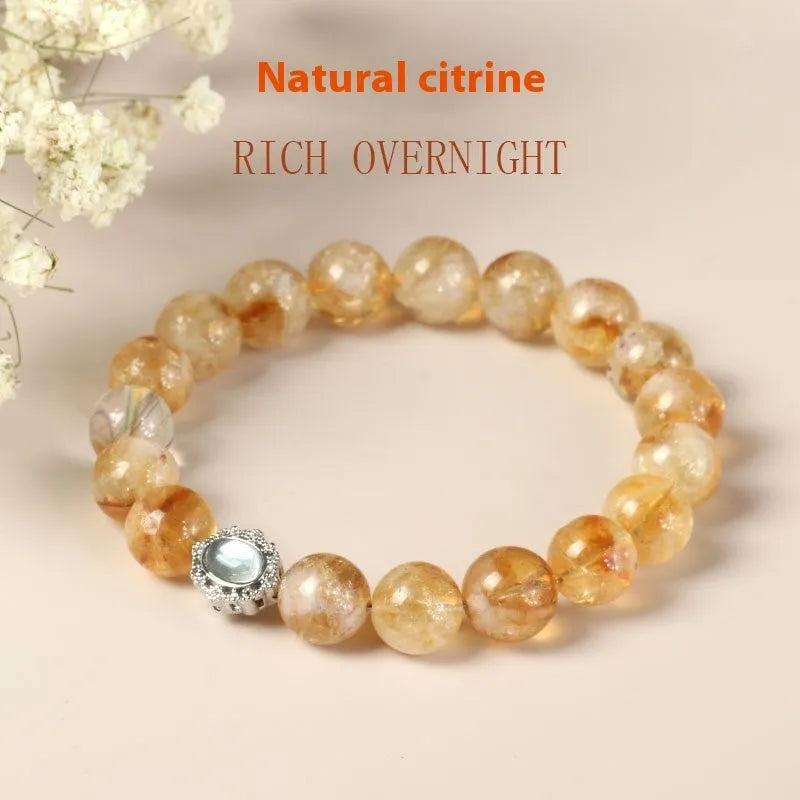 Citrine crystal bracelet with 10mm geometric faceted beads on wrist
